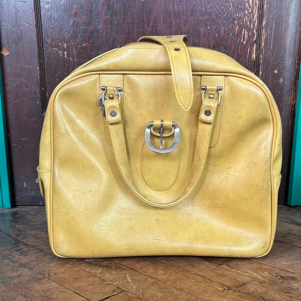 American Tourister Bag with Yellow Accents